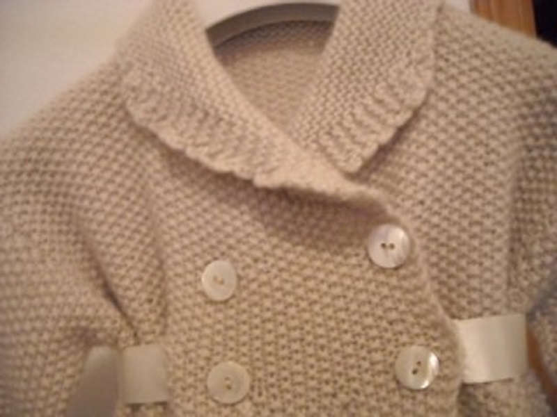 Schema maglia per cappotto di lana ai ferri per bambina, progetto Barbara Ajroldi