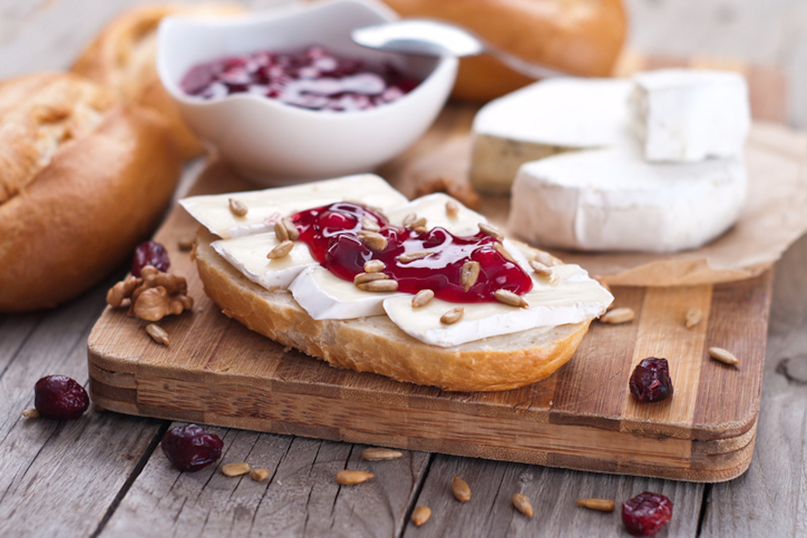 bread served with camembert and cranberry.
