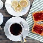 Breakfast with tea and rusks with jam