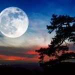 Full moon and sunset on mountain in thailand