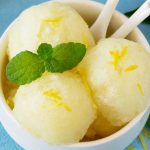 Homemade Fresh fruit lemon sorbet ice cream in a white bowl.