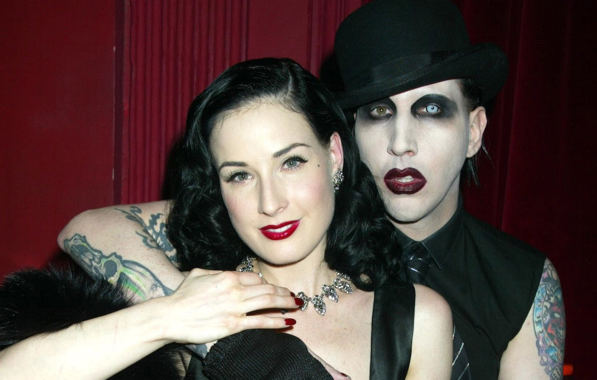 Dita Von Teese performs a strip tease