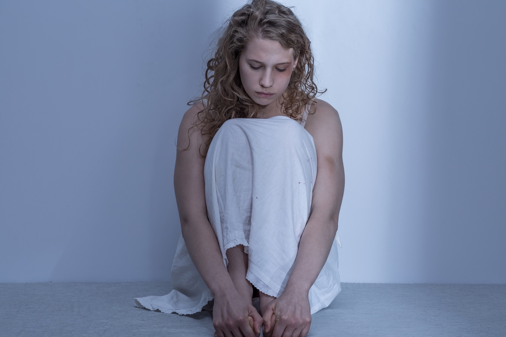 Unable to talk about her traumatic experiences