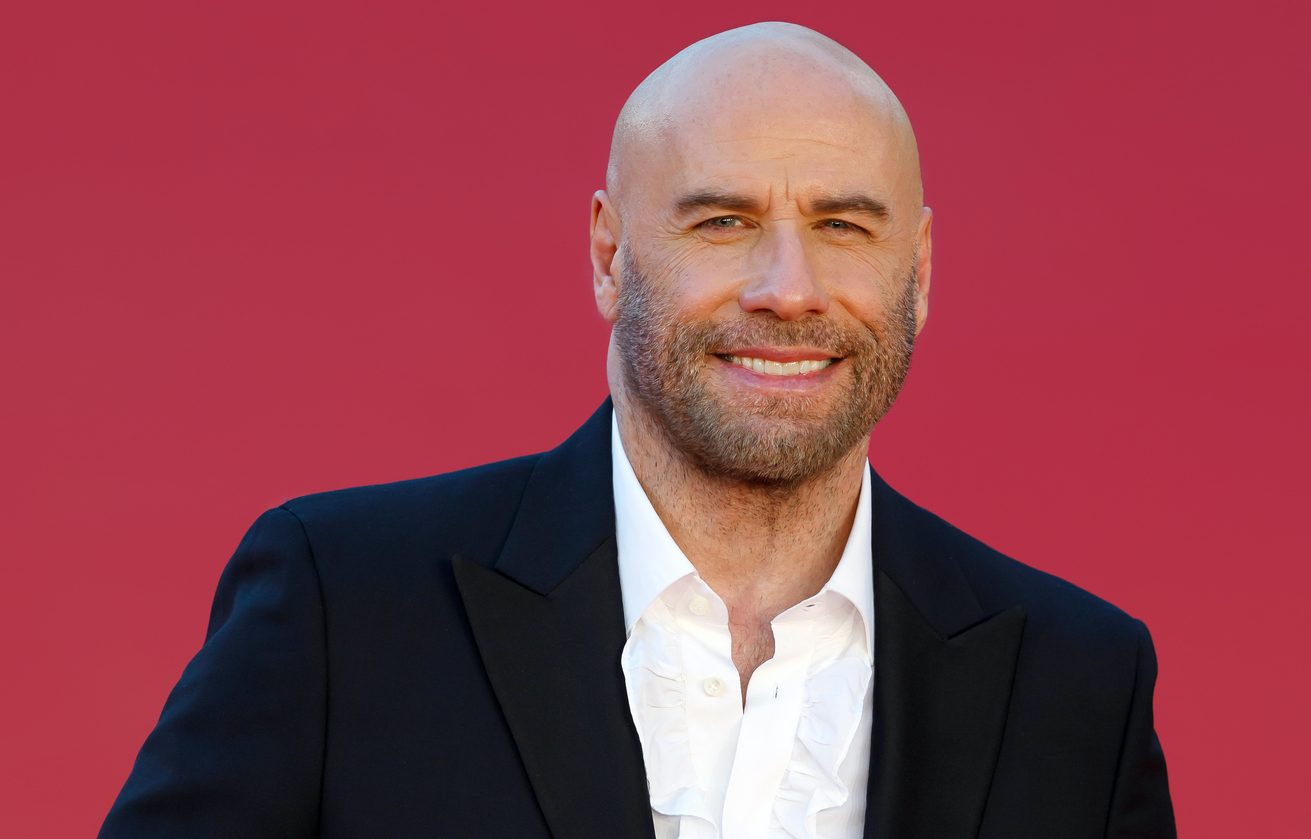 John Travolta walk the red carpet during the 14th Rome Film Festival